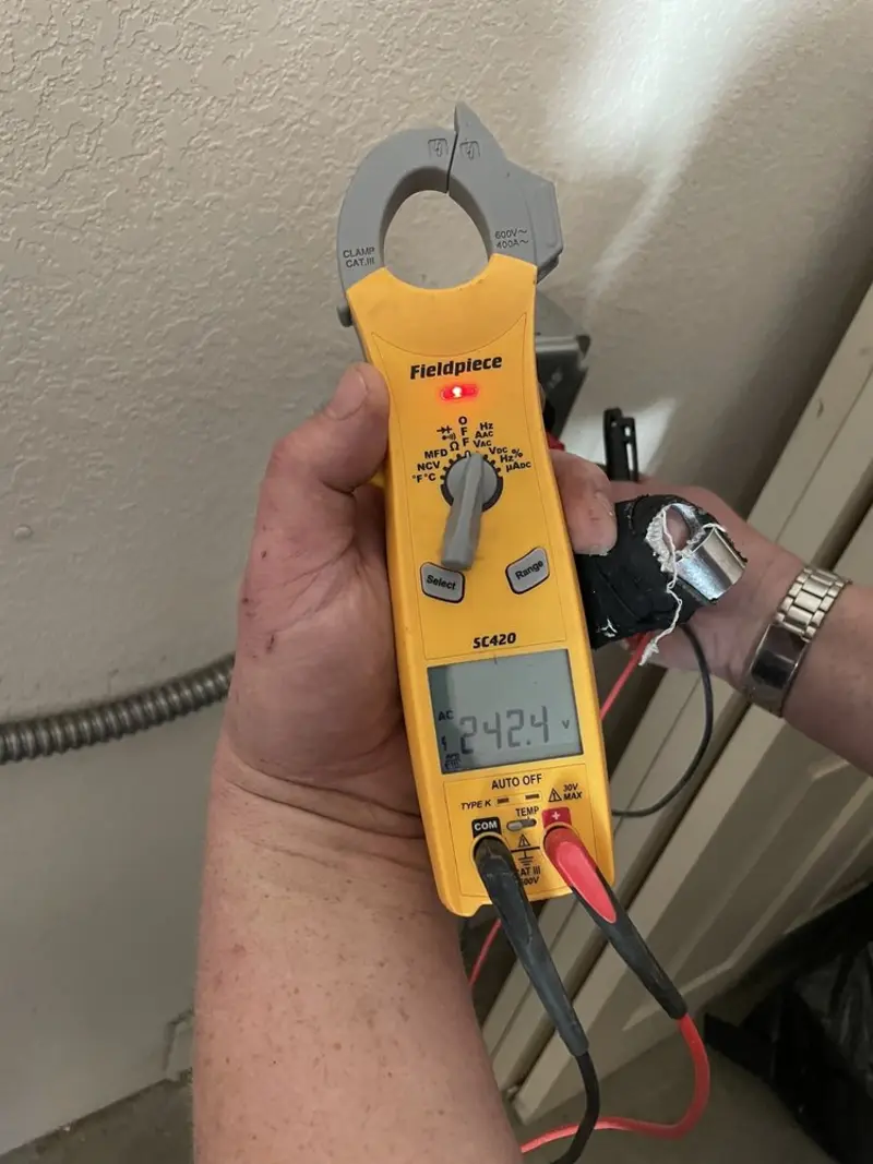 Voltage testing with clamp meter during Generator Installation in Gonzales